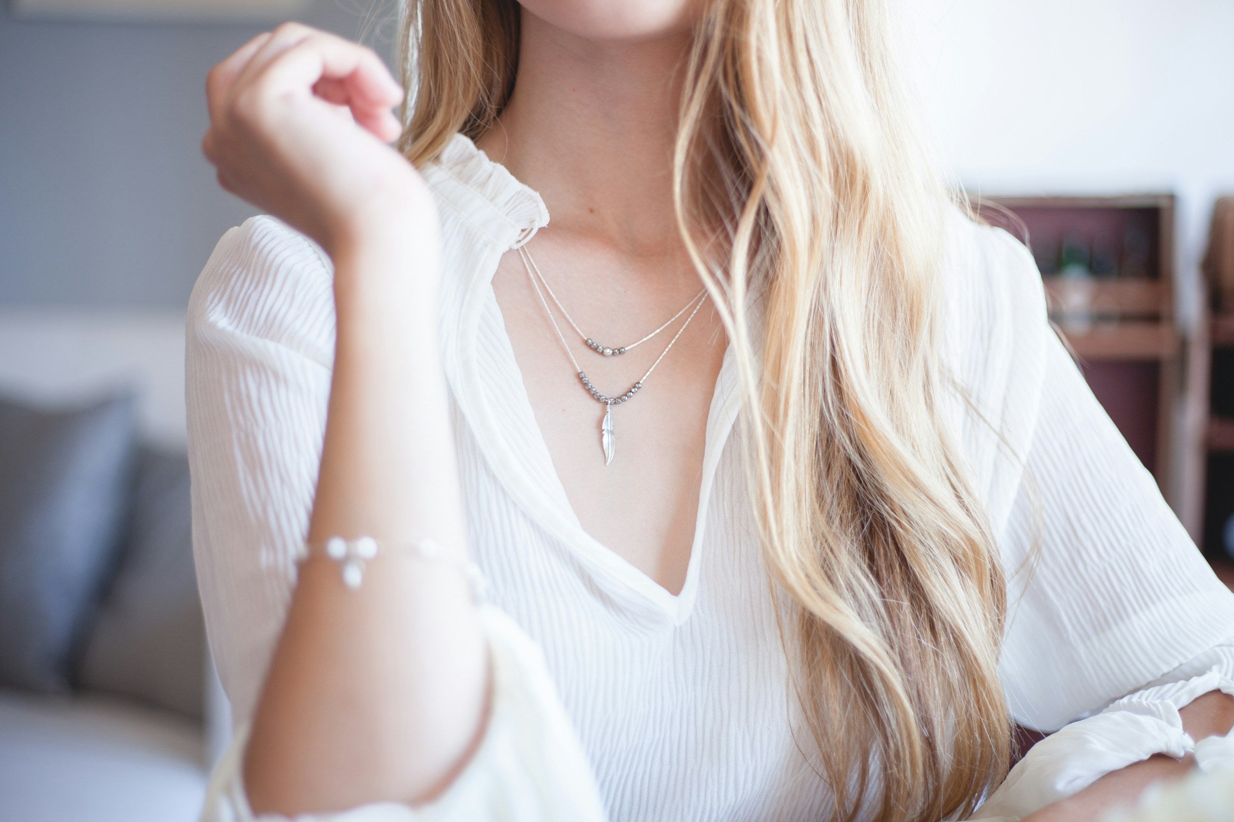 Silver Outlet Necklaces and Bracelet on Model